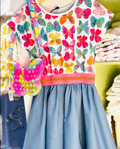 Spring with this butterfly dress