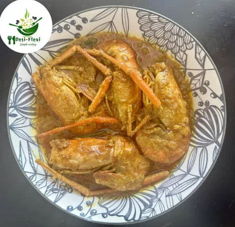 নারিকেল দুধে গলদা চিংড়ি মালাই কারি।