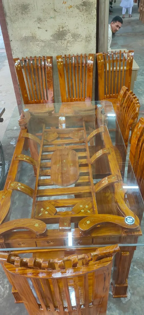 ৬ চেয়ারের সেগুন কাঠের ডাইনিং টেবিল।