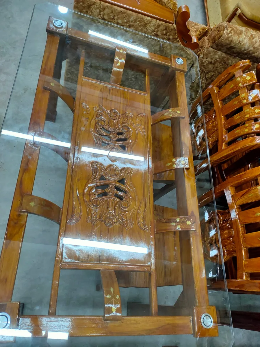 ৬ চেয়ারের সেগুন কাঠের ডাইনিং টেবিল।