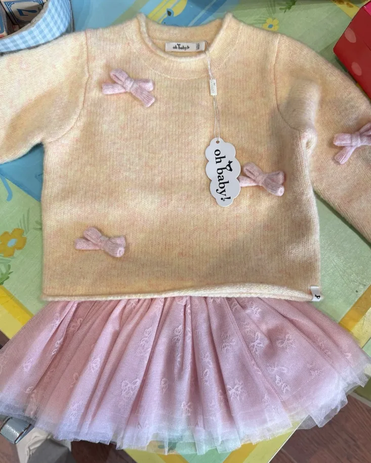 Skirt twirls sweater