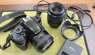 Nikon d 3200 with 50 mm prime lens and 18-55 kit