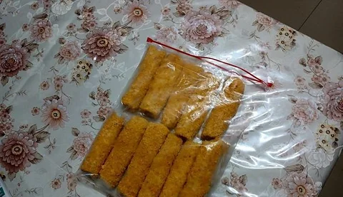 Frozen chicken vegetable roll